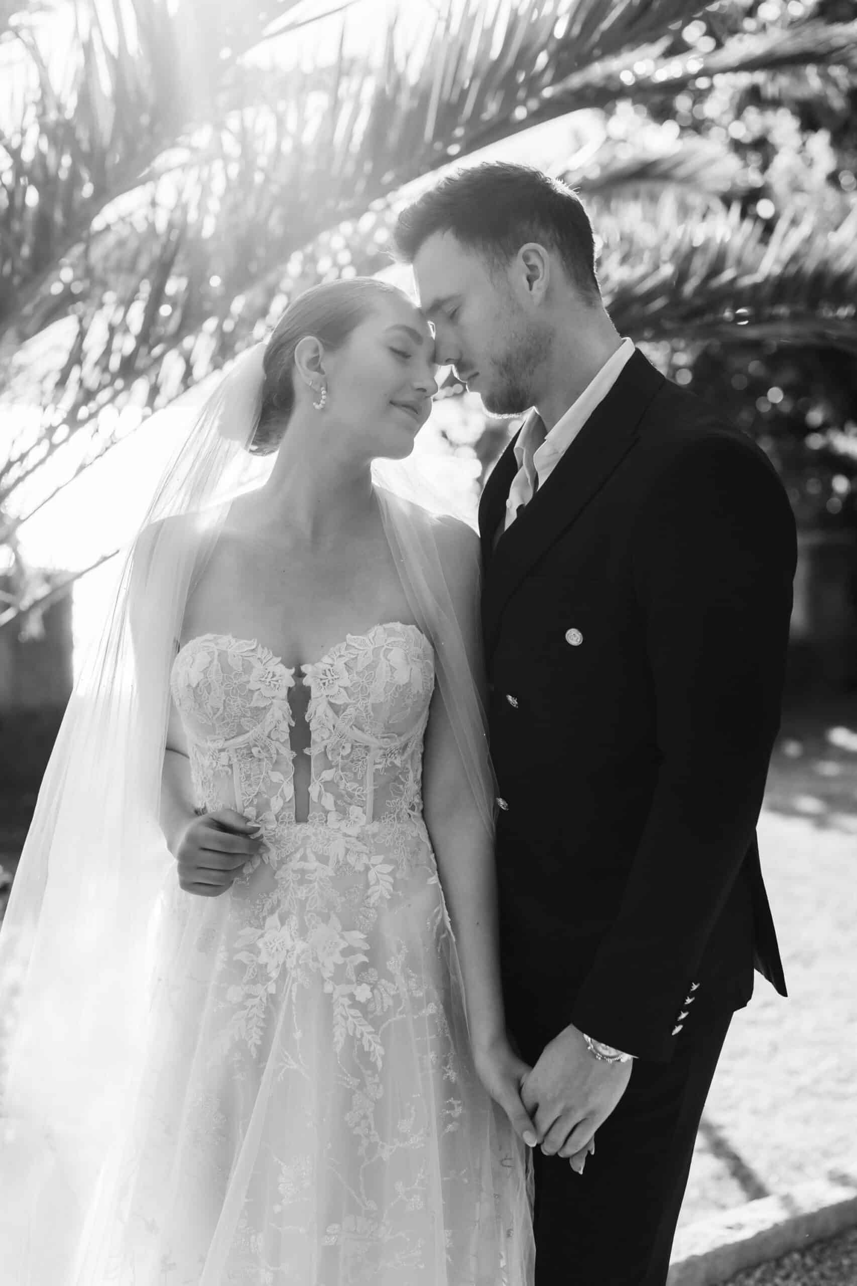 Bride and groom close together at Villa Monastero, Lake Como