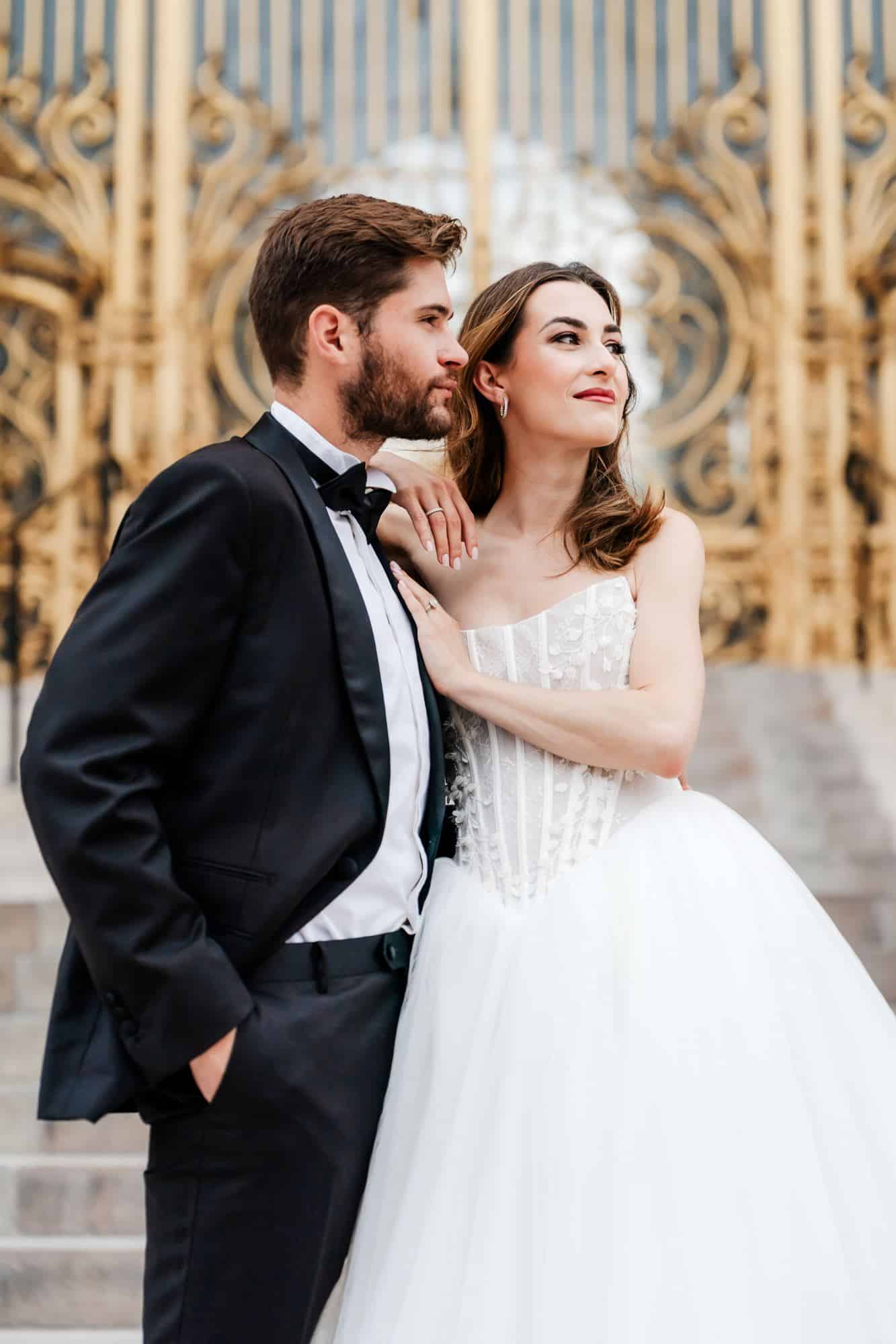 Bride and groom at the Petit Palais gate, Paris