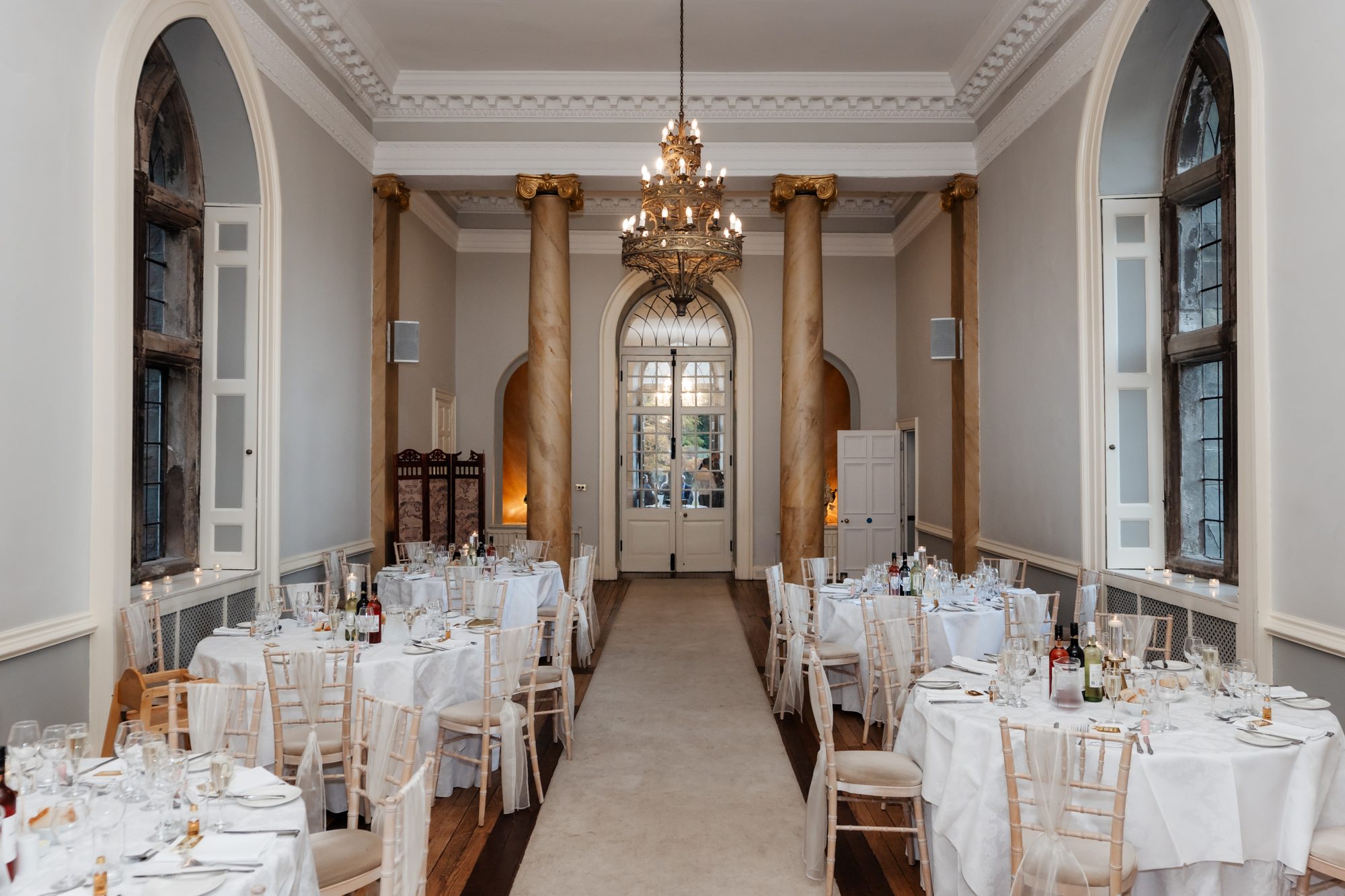 Reception dining room fully dressed at Clearwell Castle