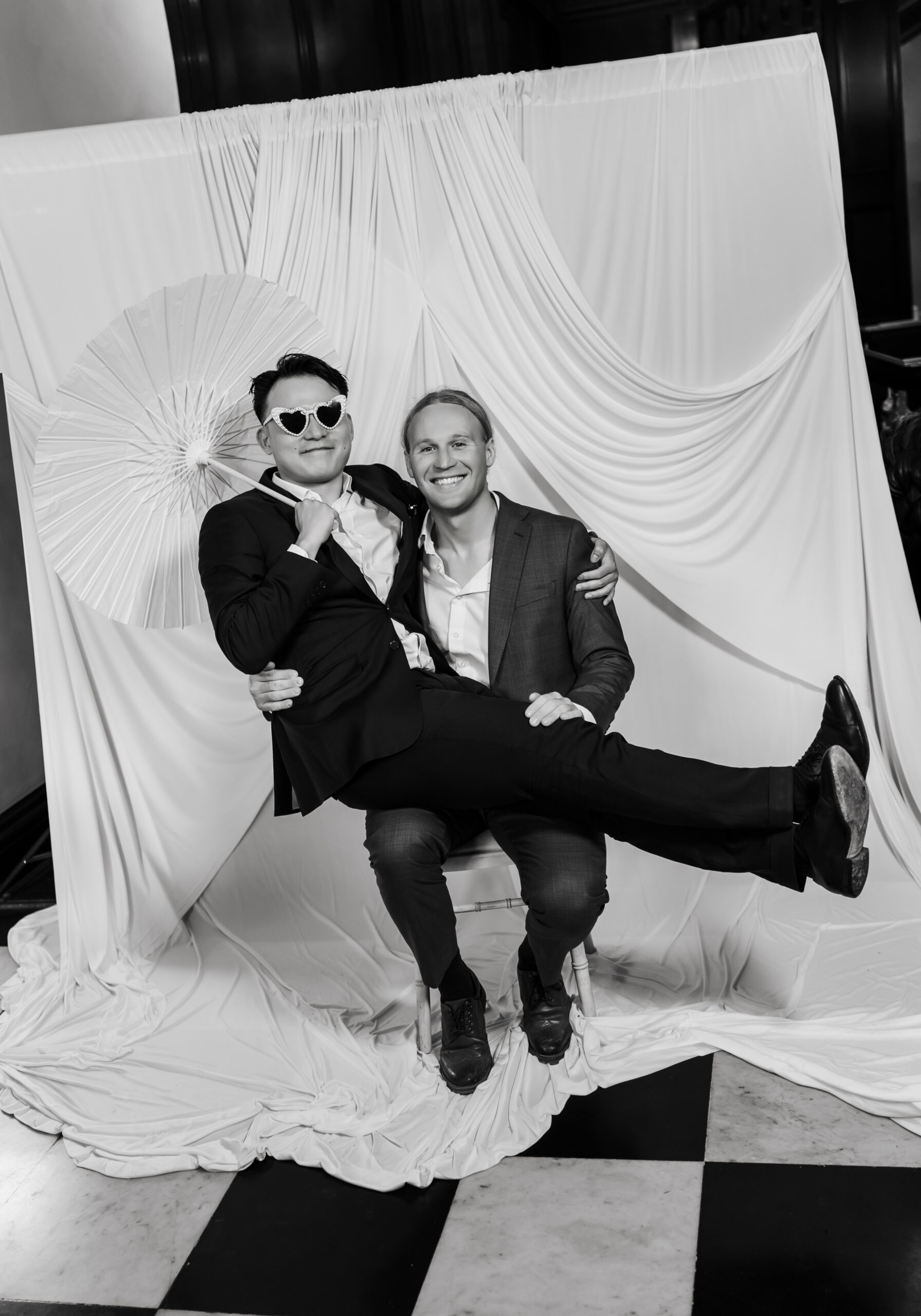 Couple posing in the editorial wedding portrait studio backdrop